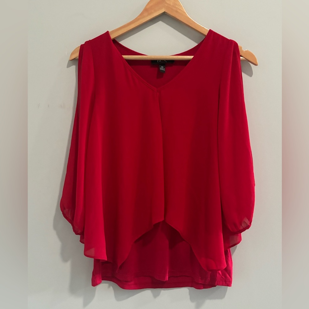 Red blouse.